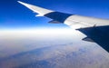 Flying above the clouds and the landscape airport over Singapore Royalty Free Stock Photo