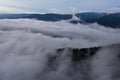 Flying above the clouds on a paraglider, free flight