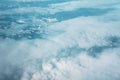 Clouds above snowy mountains Royalty Free Stock Photo