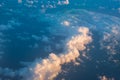 Flying above the clouds. Aerial view from the airplane Royalty Free Stock Photo