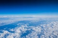 Flying above the clouds. view from the airplane Royalty Free Stock Photo