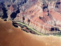 Flying above Colorado river in grand canyon Royalty Free Stock Photo
