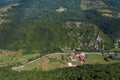 Flying above a deep valley and deciduous forest by drone Royalty Free Stock Photo