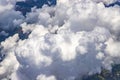 Flying above a dense layer of white clouds. Great and beautiful clouds. Royalty Free Stock Photo