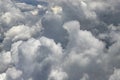 Flying above a dense layer of white clouds. Great and beautiful clouds. Royalty Free Stock Photo