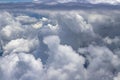 Flying above a dense layer of white clouds. Great and beautiful clouds. Royalty Free Stock Photo