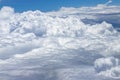 Flying above a dense layer of white clouds. Great and beautiful clouds. Royalty Free Stock Photo