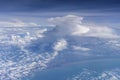 Flying above the earth and above the clouds in territory Singapore. Airplane window view Royalty Free Stock Photo