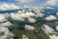 Flying above the earth and above the clouds in territory of Tanzania, Africa Royalty Free Stock Photo