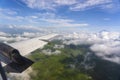 Flying above the earth and above the clouds in territory of Tanzania, Africa Royalty Free Stock Photo