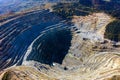 Flying above an open pit mine, copper excavation in Rosia Poieni, Romania. Aerial view Royalty Free Stock Photo