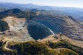 Flying above an open pit mine, copper excavation in Rosia Poieni, Romania. Aerial view Royalty Free Stock Photo