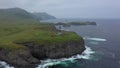 Flying Above the Shpanberg Lighthouseon Shikotan Island. on Cape. Lesser Kuril Chain, Russia.