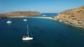 Flying above yachts anchored near a Kolona beach in the lagoon