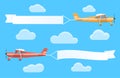 Flying advertising banners pulled by light planes Royalty Free Stock Photo