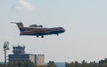 Flying aerial firefighting pour water over the fire for a demo flight in Zhukovsky during MAKS-2019 airshow.