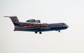 Flying aerial firefighting pour water over the fire for a demo flight in Zhukovsky during MAKS-2019 airshow.