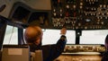 Flying aircrew preparing to takeoff with airplane in cockpit Royalty Free Stock Photo