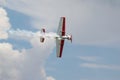 Flying airplane in the blue sky