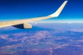 Flying airplane over Mexico Clouds Sky Volcanoes Mountains City desert Royalty Free Stock Photo