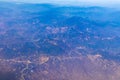 Flying airplane over Mexico Clouds Sky Volcanoes Mountains City desert Royalty Free Stock Photo