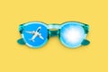 Flying airplane, sun, blue sky, sunglasses reflection, glasses, summer holidays, vacation flight, travel agency, tourism