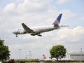 A flying airplane of United Airlines Royalty Free Stock Photo