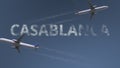 Flying airplanes trails and Casablanca caption. Traveling to Morocco conceptual 3D rendering