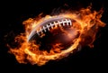 Flying american football ball in flames on pure black background