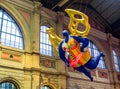 Flying angel balloon in Zurich station