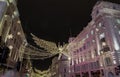 Flying angel Christmas decoration led lights display. Dramatic view of the traditional Christmas decoration lights hanging above