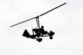 Flying autogyro silhouette on white background Royalty Free Stock Photo