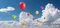 Flying balloons in a blue sky with clouds, A wide banner with copy space area Royalty Free Stock Photo