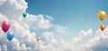 Flying balloons in a blue sky with clouds, A wide banner with copy space area Royalty Free Stock Photo