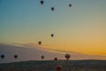 Flying on the balloons early morning in Cappadocia. Colorful sunrise in valley, Goreme village location, Turkey, Asia. Artistic