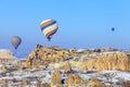 Flying balloons over mountains at sunset. Capadocia. Turkey.