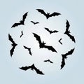Flying bats Chiroptera arranged in a circular pattern on a light Royalty Free Stock Photo