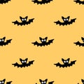 Flying bats seamless pattern. Cute Spooky vector Illustration. Halloween backgrounds and textures in flat cartoon gothic style. Royalty Free Stock Photo