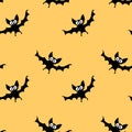 Flying bats seamless pattern. Cute Spooky vector Illustration. Halloween backgrounds and textures in flat cartoon gothic style. Royalty Free Stock Photo