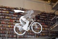 Flying bicycle. Books store in Lisbon, Portugal. Livraria Ler devagar. LX Factory. Tourism. Education. Visit Portugal.