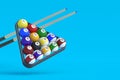Flying billiard balls in plastic triangle and cues. Copy space