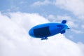 Flying blimp with blank advertising sign area Royalty Free Stock Photo