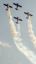 Four piston propeller aerobatic aicraft during display. Royalty Free Stock Photo