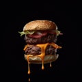 Flying burger filled with beef and cheese on a black background photo, in the style of playful surrealism, levitation Royalty Free Stock Photo