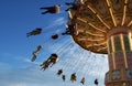 People having fun at the Flying chair ride in Tivoli, Copenhagen