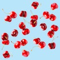 Flying cherries vertical isolated as package design elements. Fresh raw cheery falling in the air Royalty Free Stock Photo