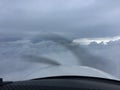 Flying Cirrus above and below clouds - pilot view