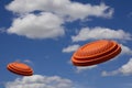 Flying clay pigeon target in the blue sky background , shotgun shooting game