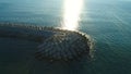 The flying copter around the bay covered with stones in Mediterranean sea of sunny Gazipasa, Antalya province in Turkey.