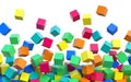 Flying 3D colored cubes on white background